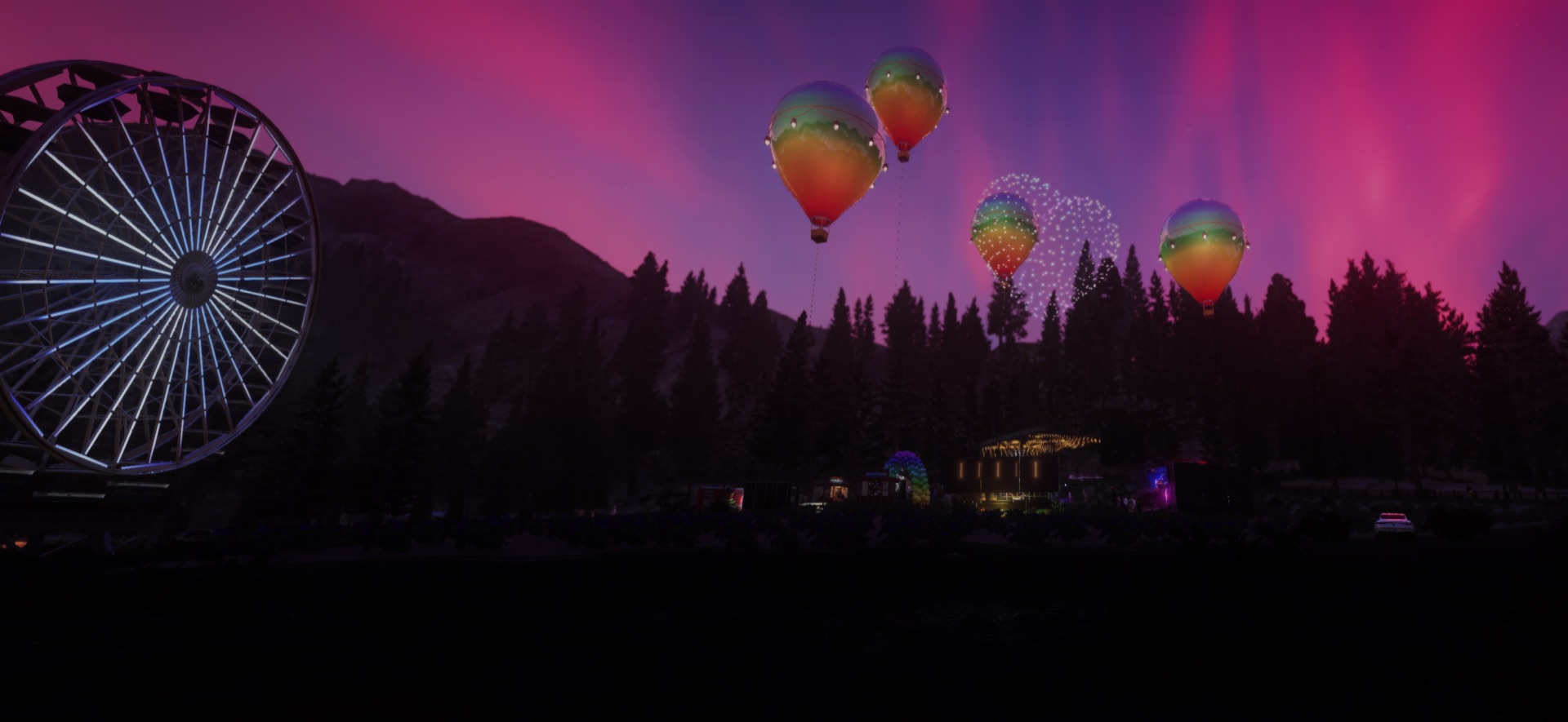 Ferris wheel, balloons and a heart of lights over the grounds