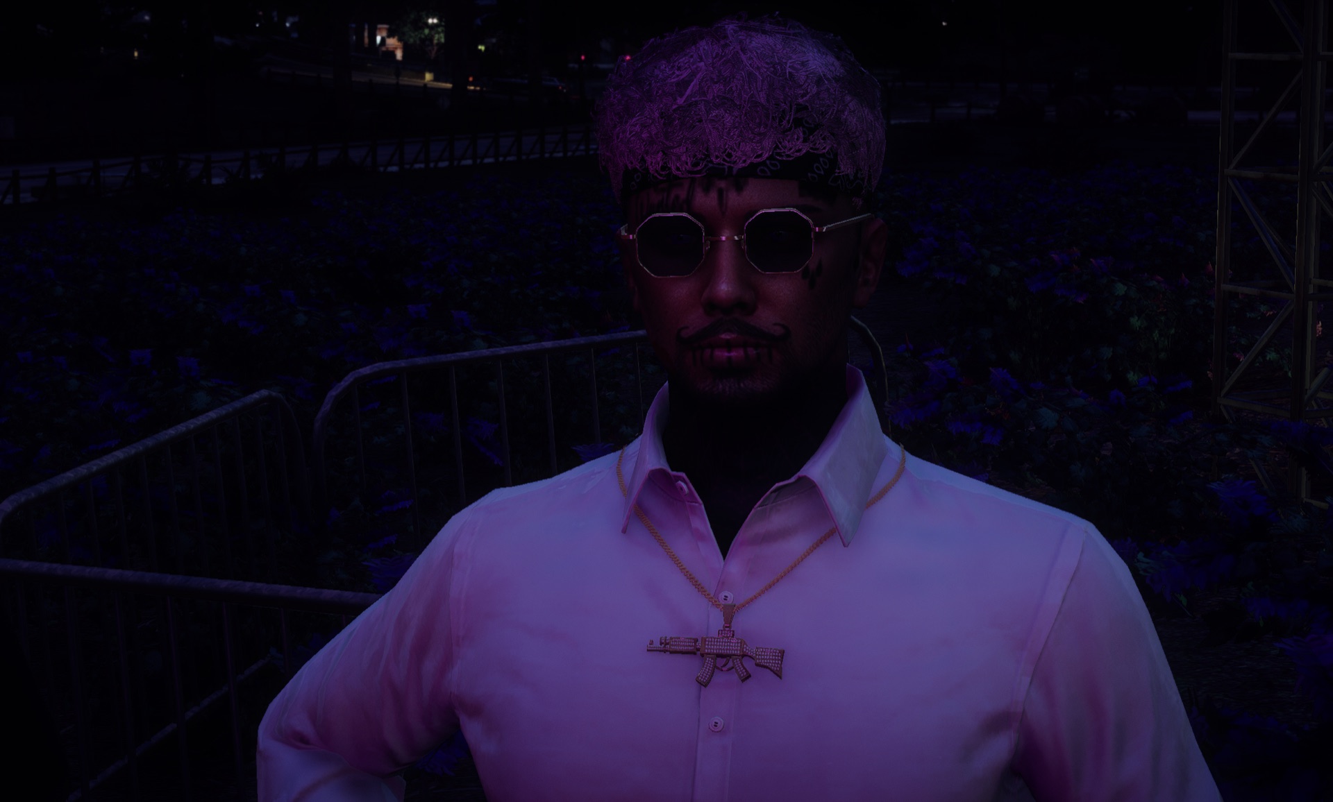 An attendee portrait in the purple stage light